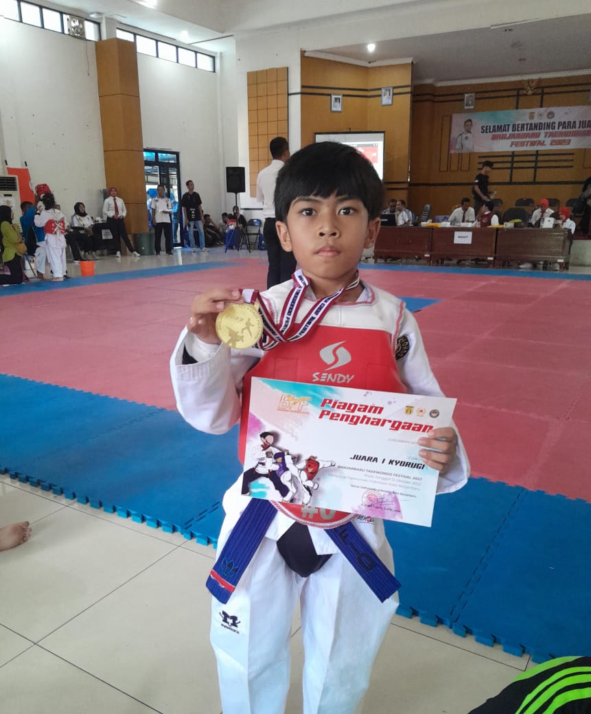 Selamat & Sukses Ananda Ahmad Syafiq Al-Madani Telah Meraih Juara 1 Kejuaraan Festival Taekwondo Tingkat SD.
